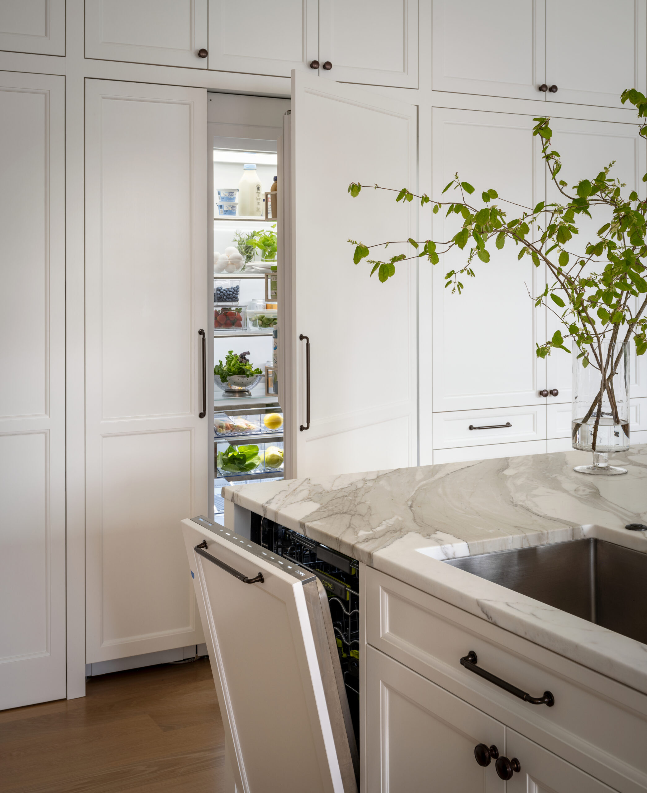 Picture of custom fridge in white kitchen